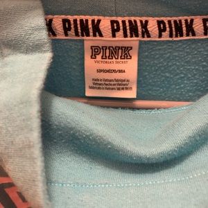 Pink pullover in a blue color